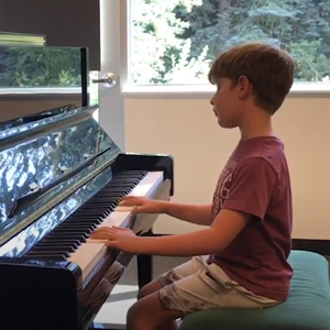 Boy playing the piano